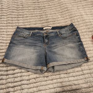 Medium wash rolled cuff Torrid jean shorts size 18.